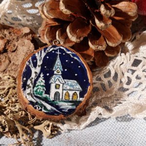Holzscheibe mit Kirche